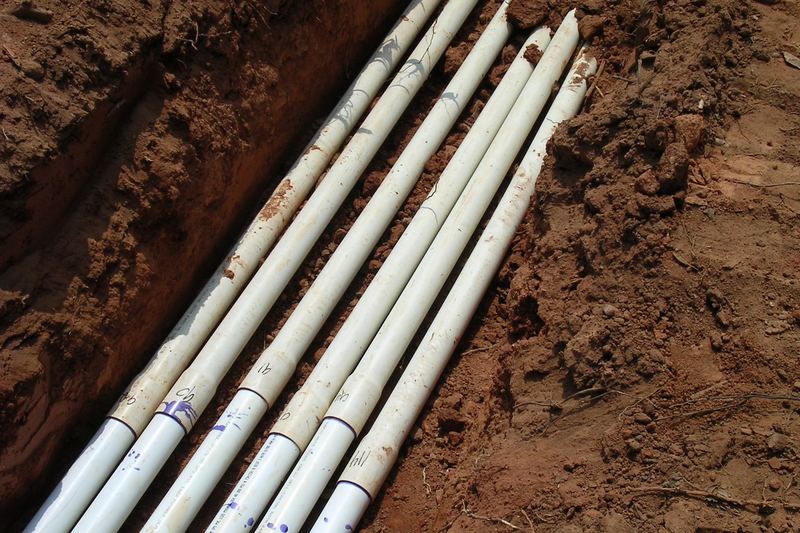 Pipe run laid on red clay soil